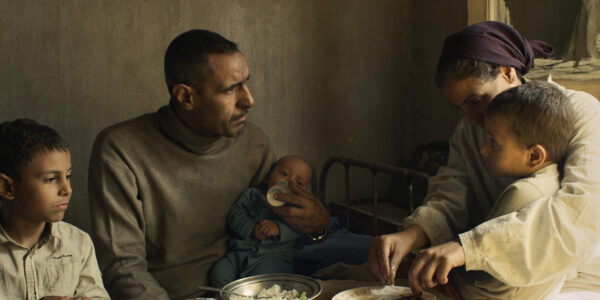 A family sitting at a table