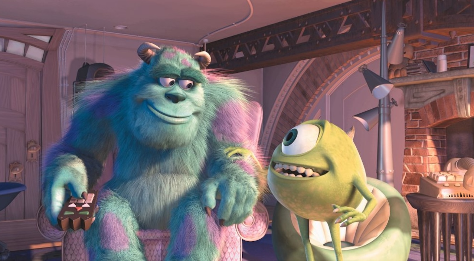 monsters inc Two animated creatures smile friendly at each other, a furry blue beast and a small round green creature with a single large eye and a mouth full of teeth