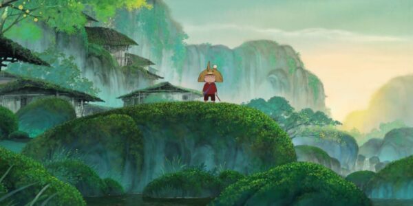 An animated character stands amidst a beautiful verdant Japanese landscape of mountains and waterfalls
